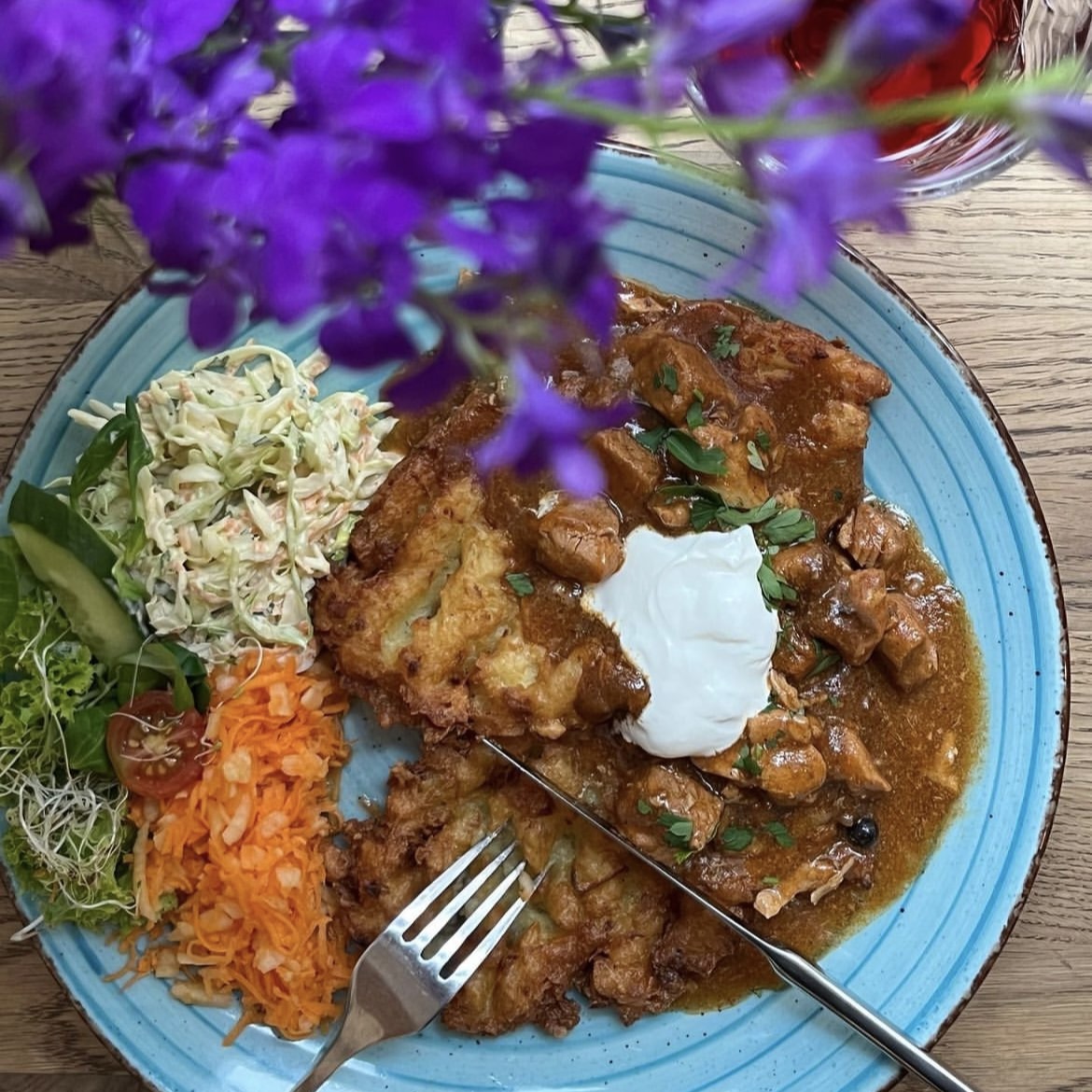Potato pancakes with pork goulash