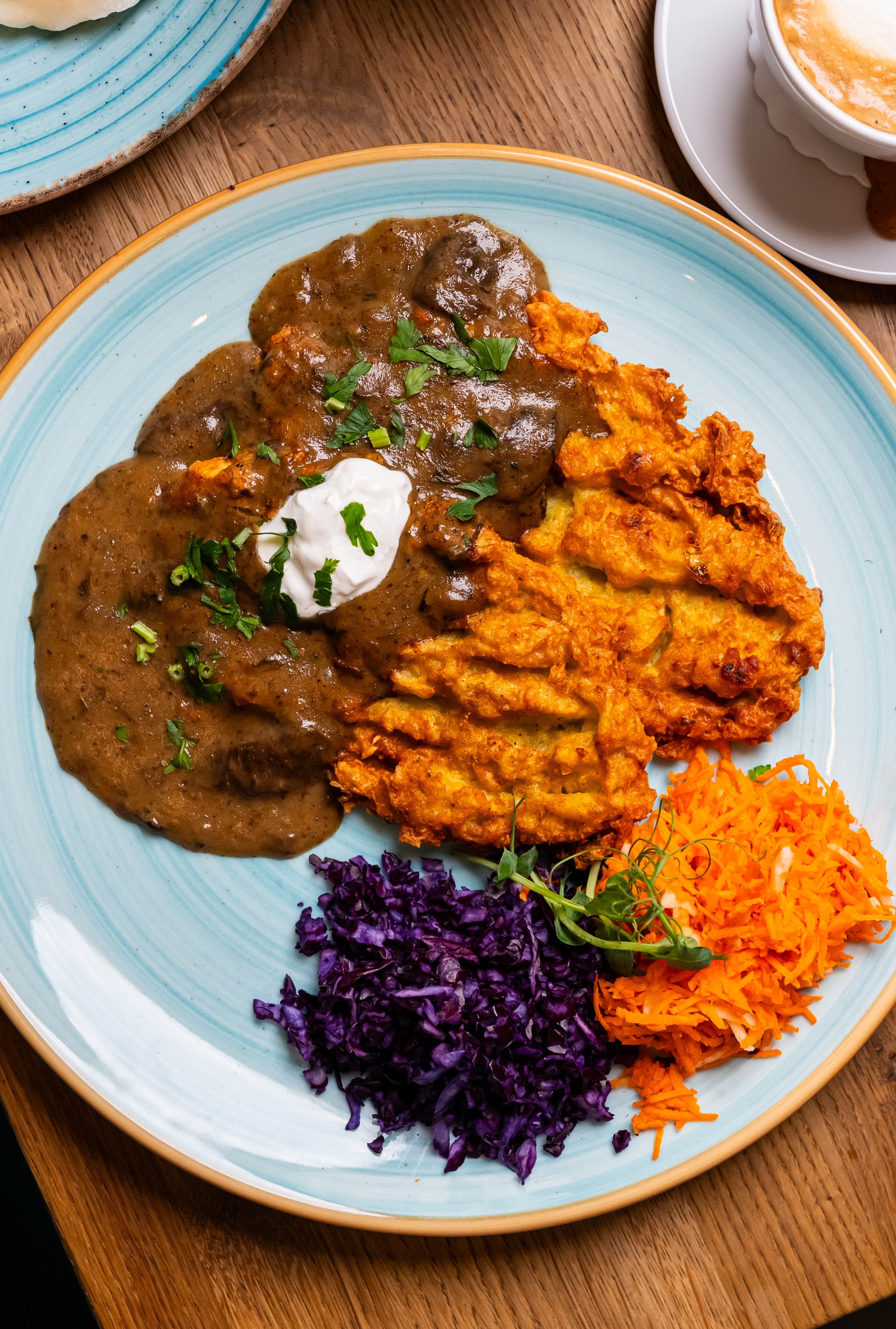Potato pancakes with forest mushroom sauce