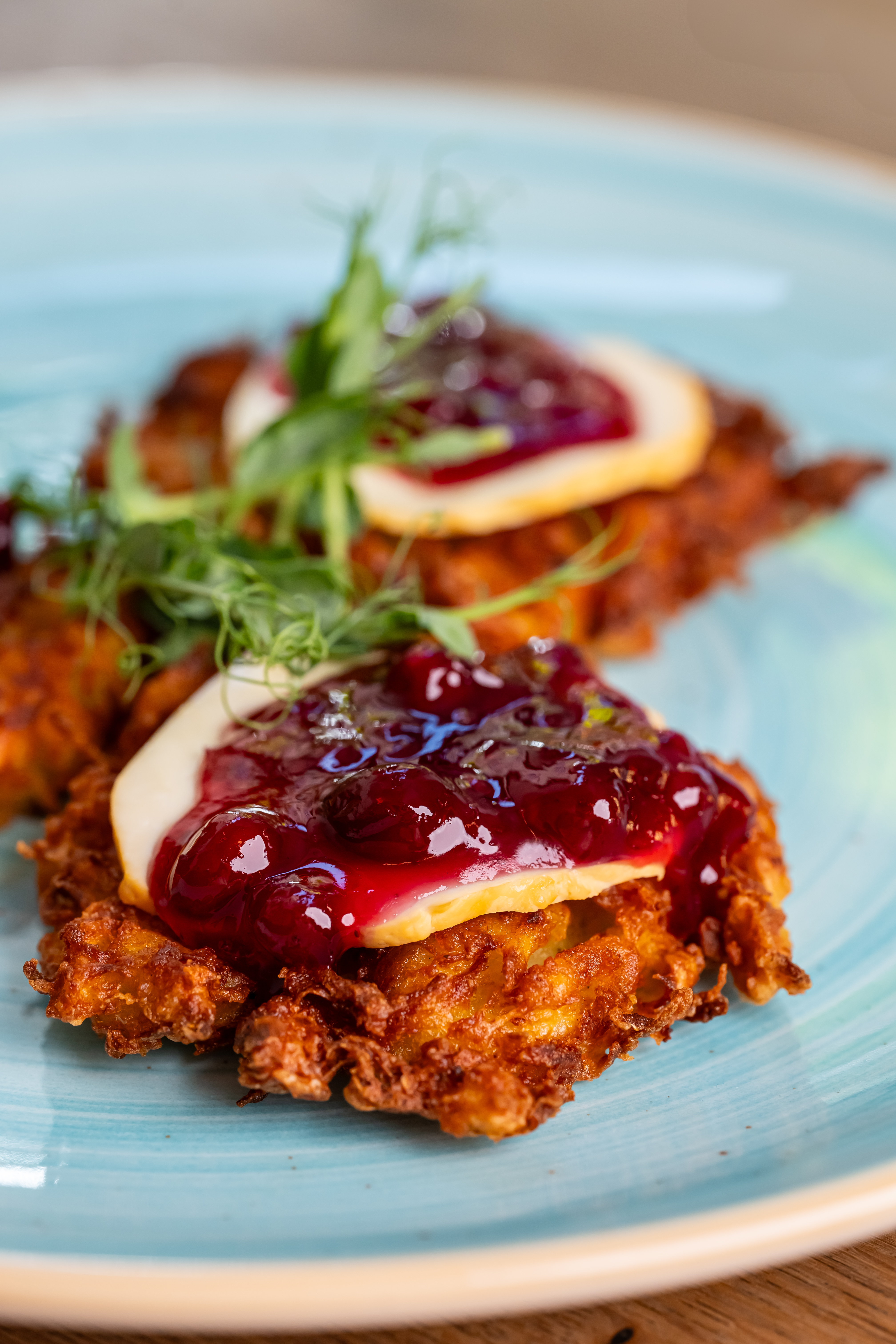 Potato pancakes with highlander cheese and cranberries