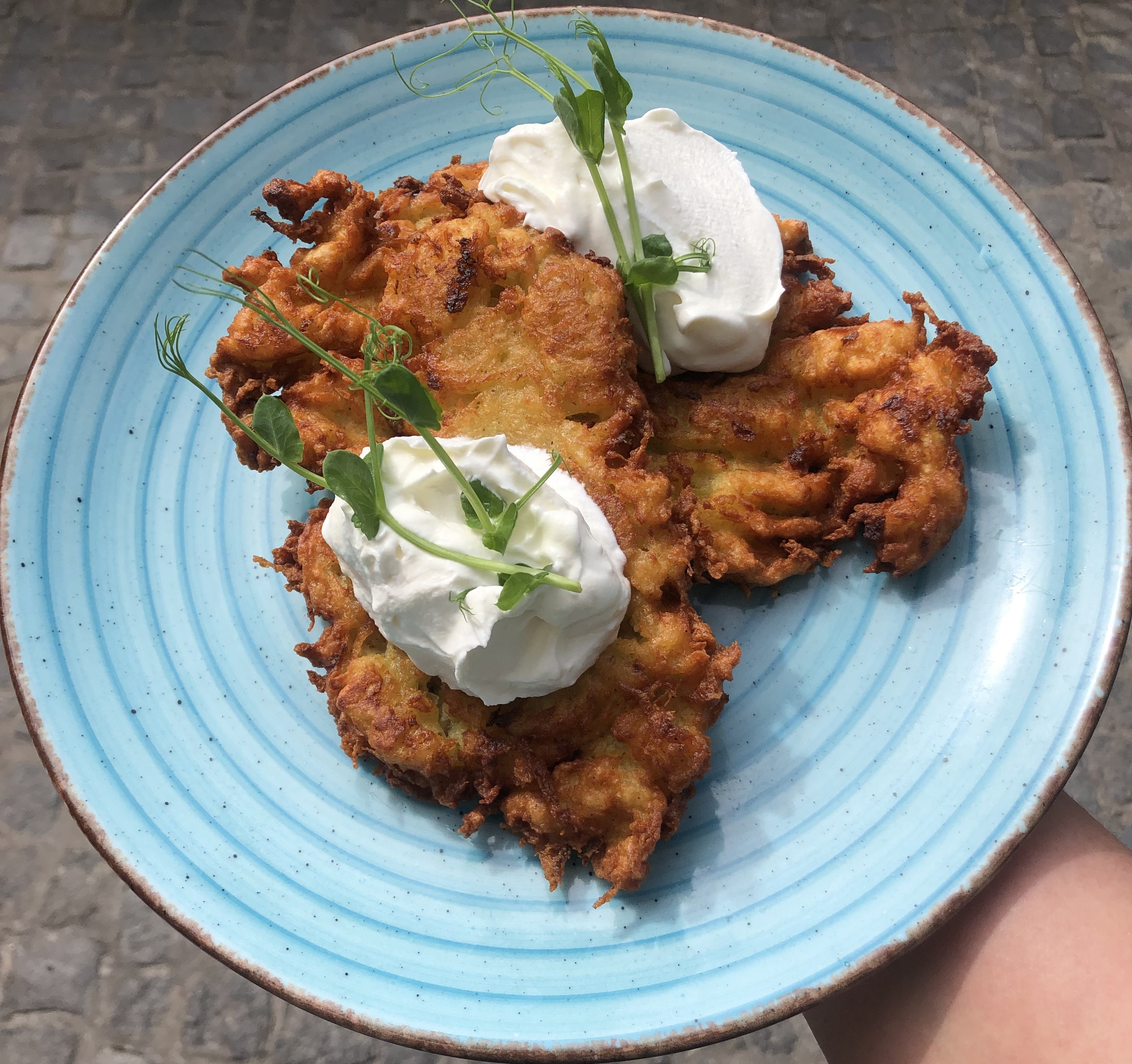 Potato pancakes with sour cream